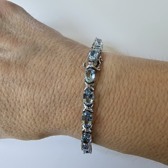 Natural Sky Blue Topaz & Diamond Accent Tennis Bracelet in Sterling Silver! - Picture 4 of 6